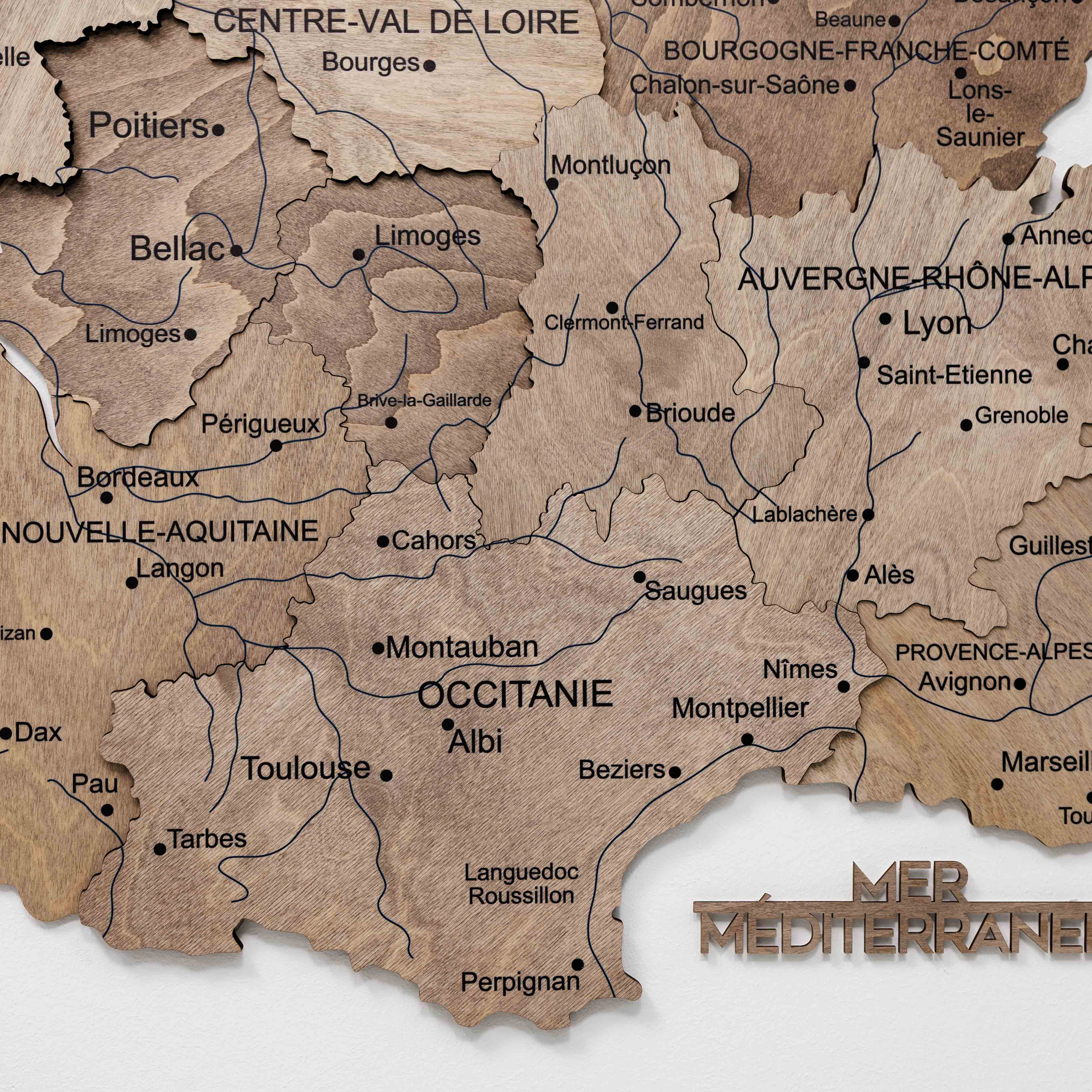 Wooden map of France with regions labeled