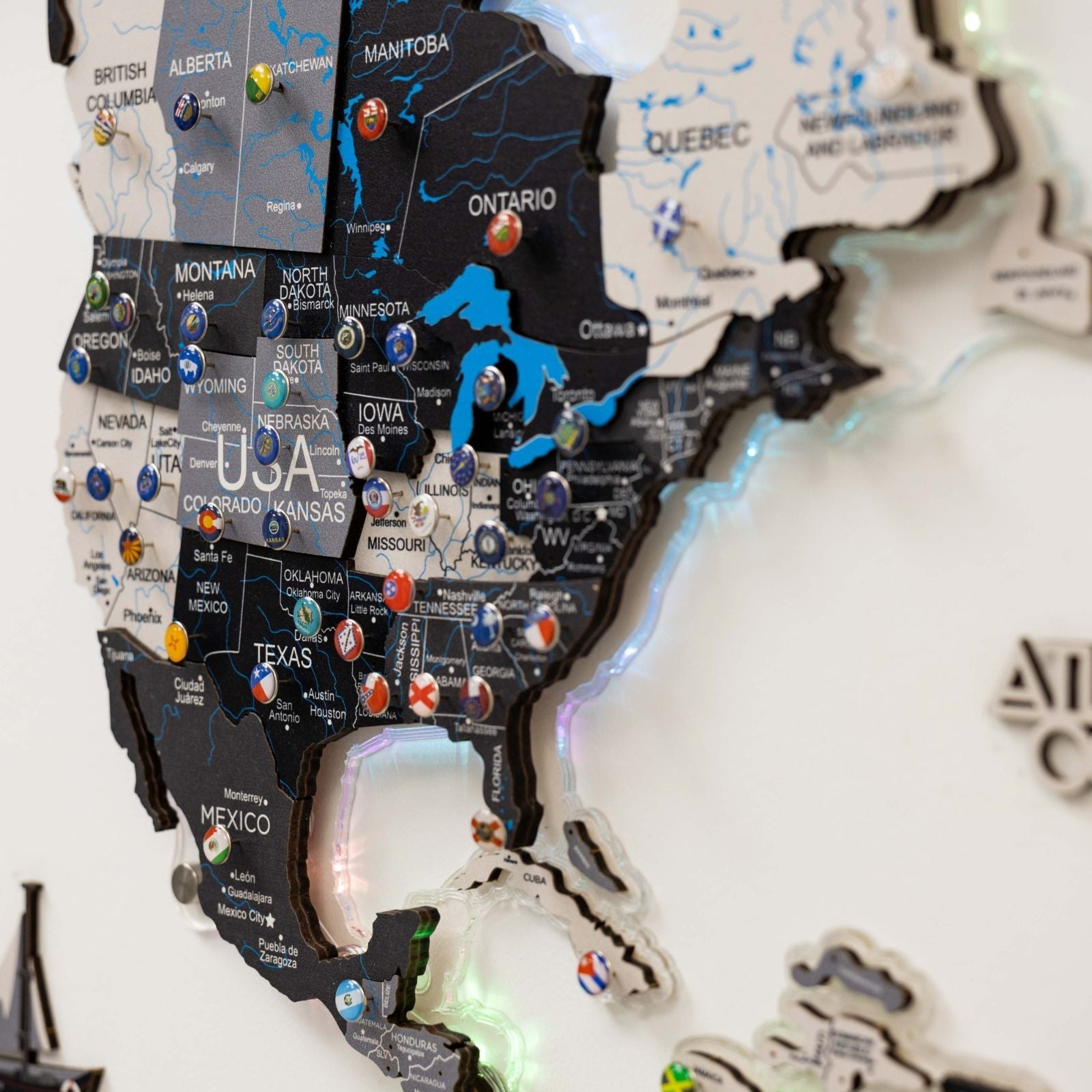 Map of North America with illuminated states and pins on a white background