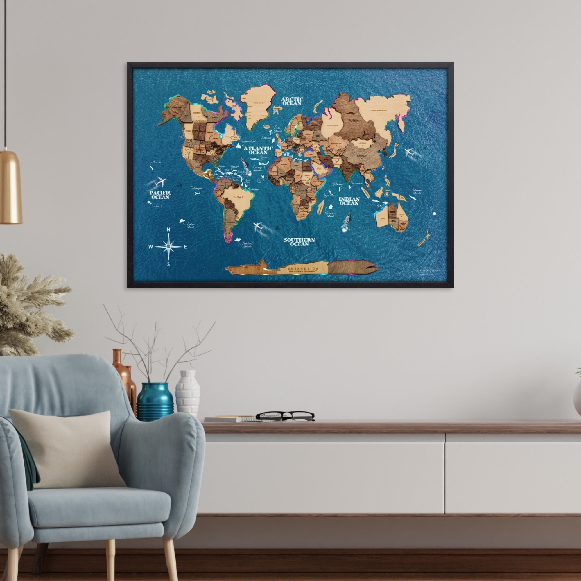 World map poster on a wall in a living room setting