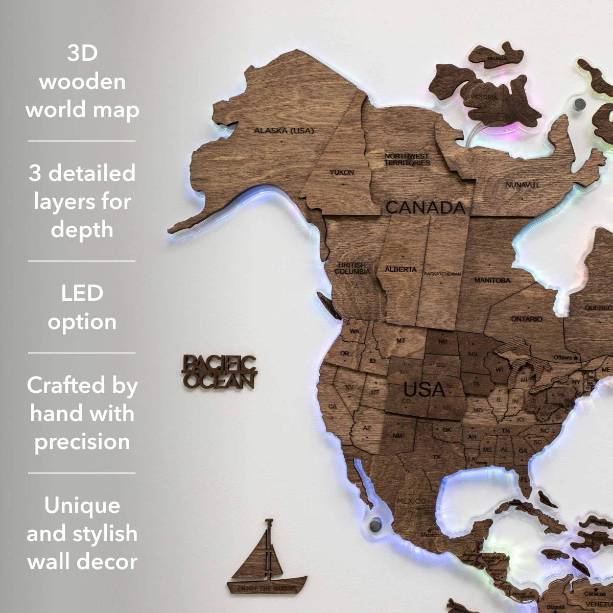 Wooden world map with LED lighting on a white background