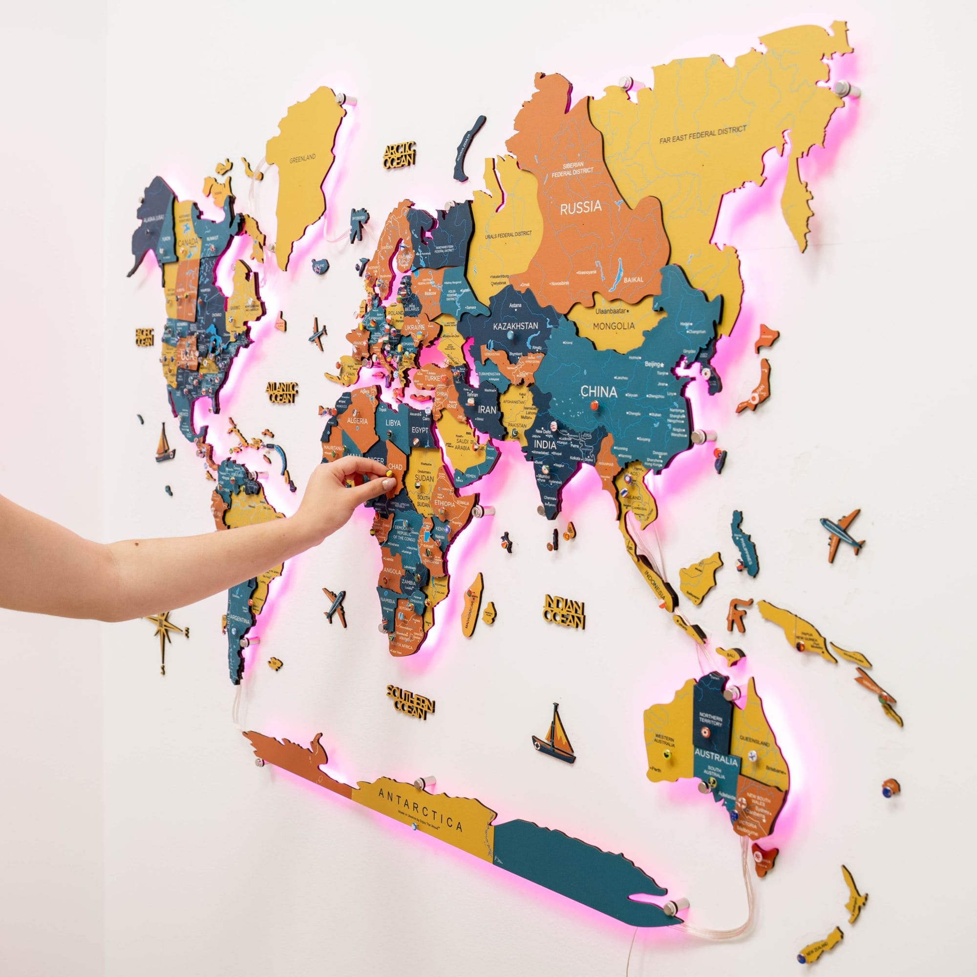 World map puzzle with colorful pieces on a light background
