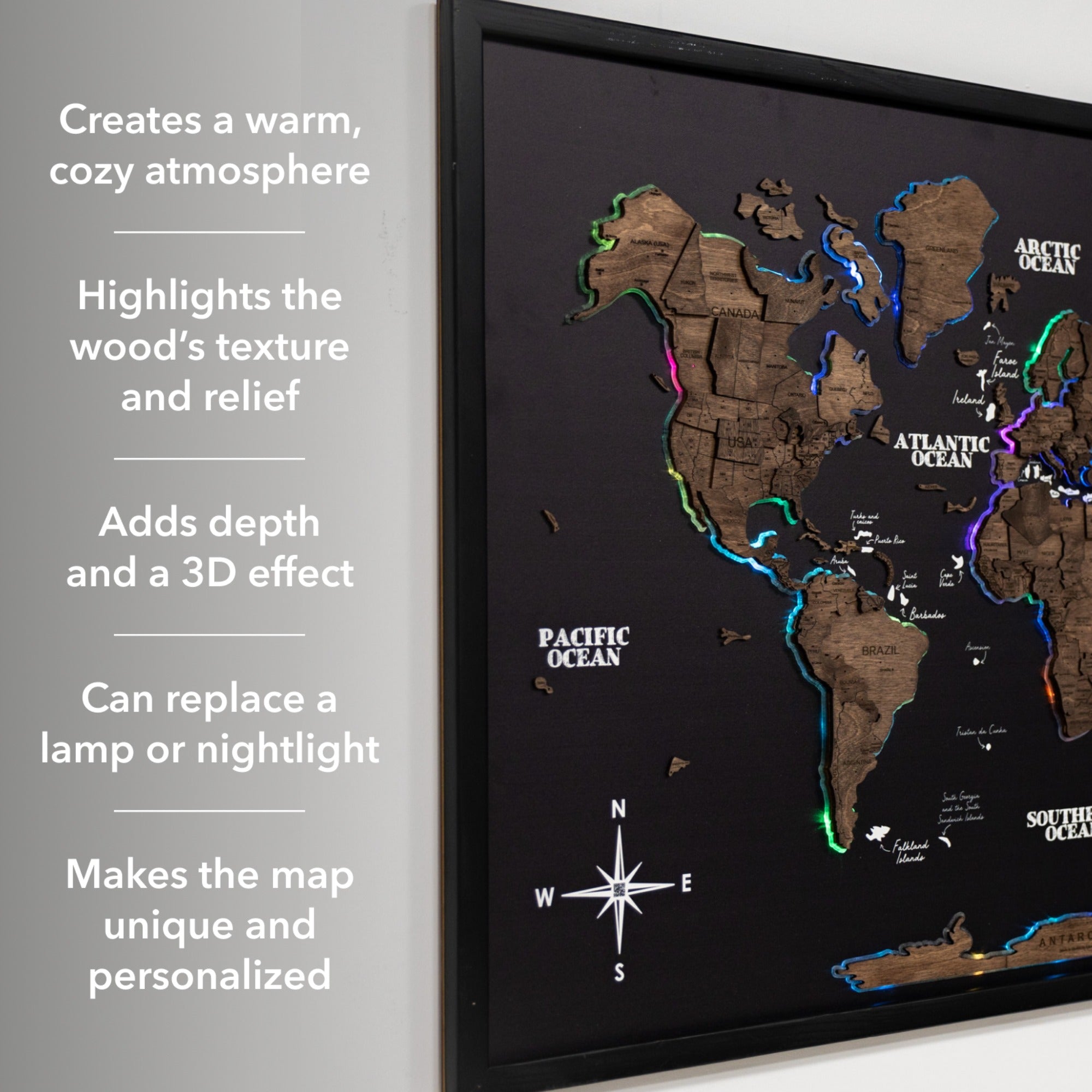 Wooden world map with LED lighting on a gray background