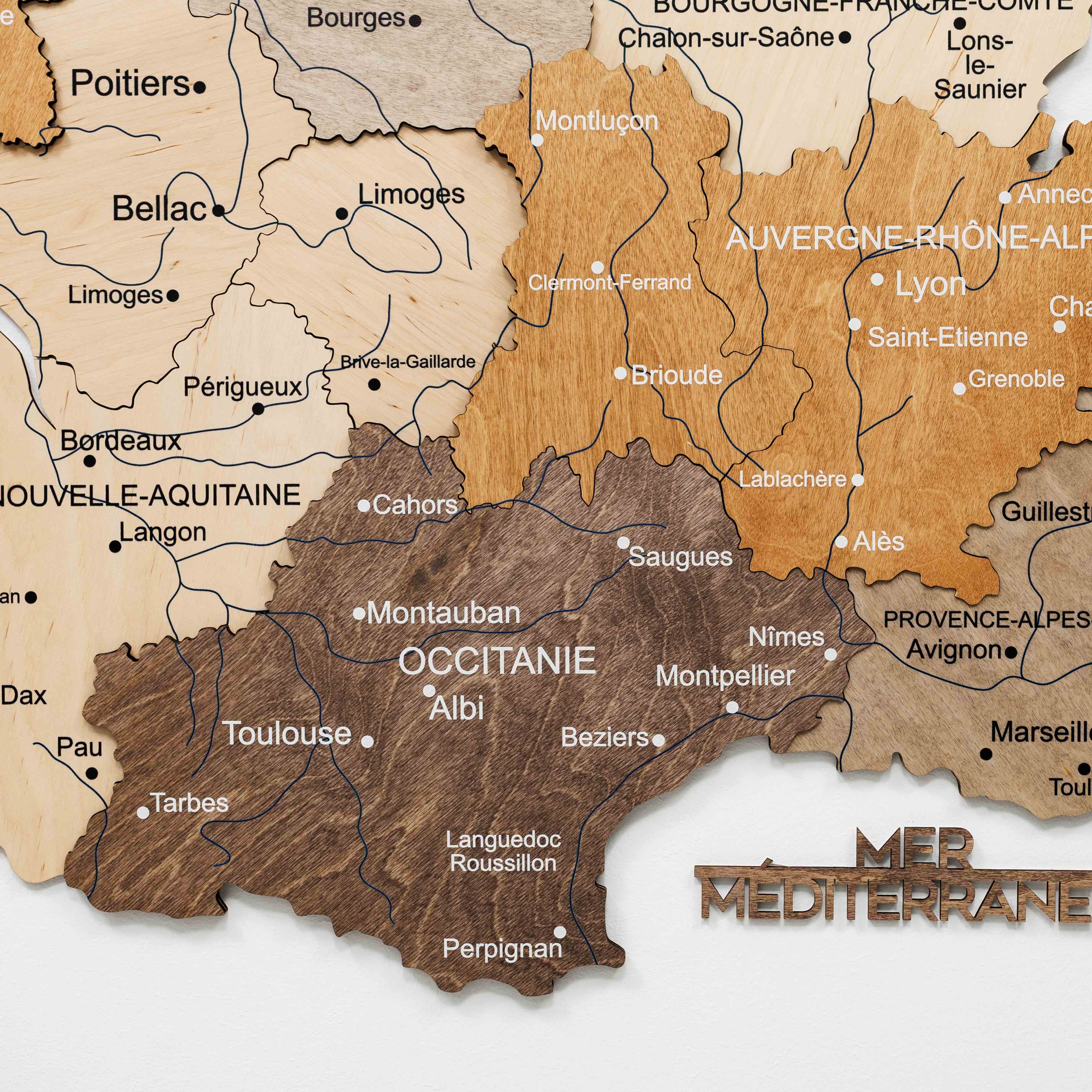 Wooden map of France with regions labeled