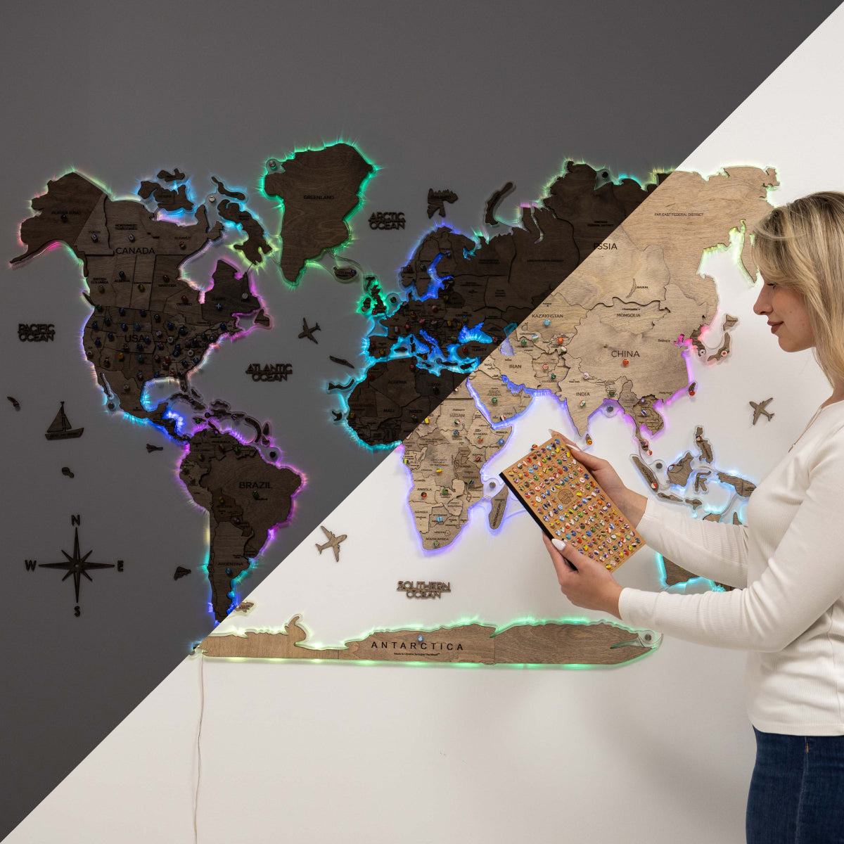 Woman holding a book next to a world map with glowing edges on a dark background