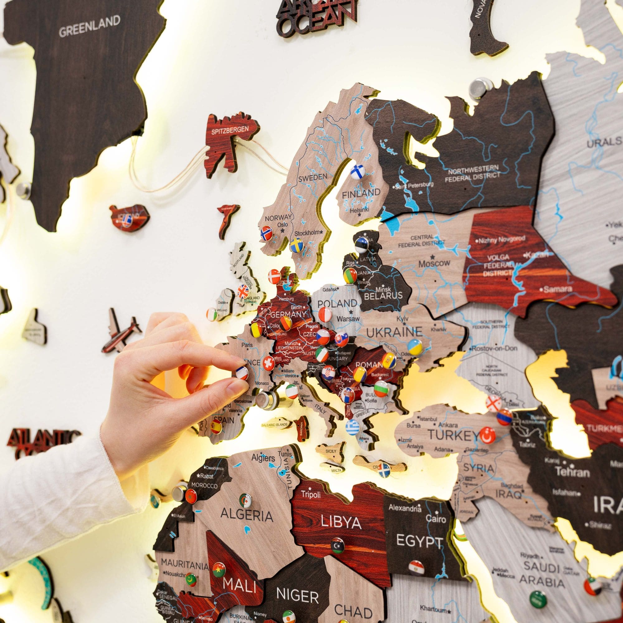 Map of Europe with country names and a hand placing a piece on the puzzle.
